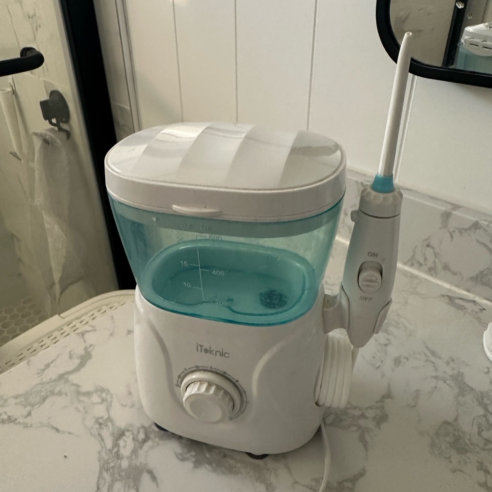 Electric Water Flosser by iTeknic
